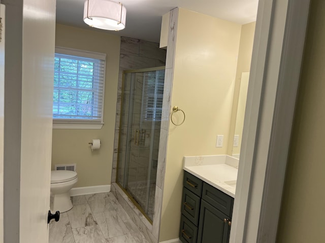 full bath featuring marble finish floors, a stall shower, baseboards, toilet, and vanity