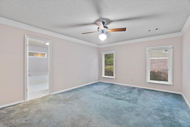 unfurnished bedroom featuring ornamental molding, a textured ceiling, visible vents, and carpet