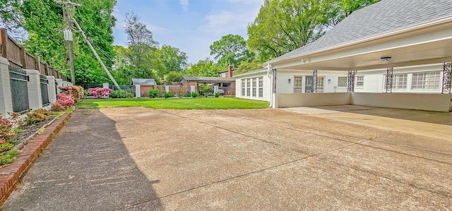 exterior space with a patio and fence