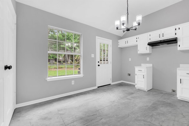 2568 Parkview Dr, Memphis, TN 38128 - laundry area with a healthy amount of sunlight, baseboards, and a notable chandelier