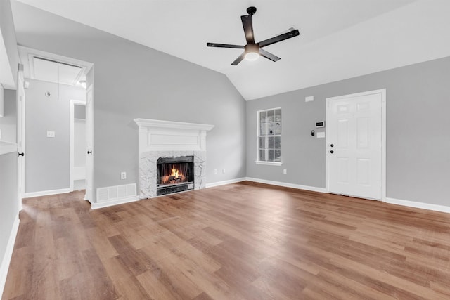 2568 Parkview Dr, Memphis, TN 38128 - unfurnished living room featuring visible vents, attic access, a ceiling fan, and wood finished floors