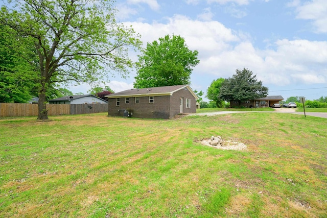 view of yard with fence