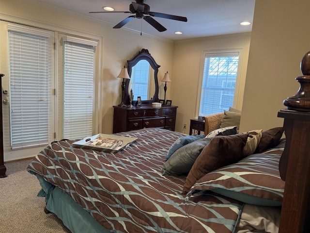 carpeted bedroom with recessed lighting, ceiling fan, and crown molding