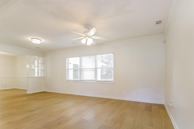 4143 Hilldale Ave, Memphis, TN 38117 - empty room with visible vents, light wood-type flooring, a ceiling fan, and ornamental molding