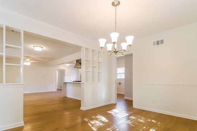 4143 Hilldale Ave, Memphis, TN 38117 - kitchen featuring crown molding, visible vents, open shelves, and wood finished floors