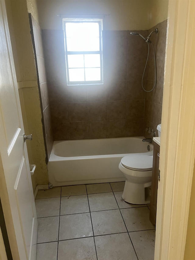 bathroom with toilet, vanity, shower / bath combination, and tile patterned floors