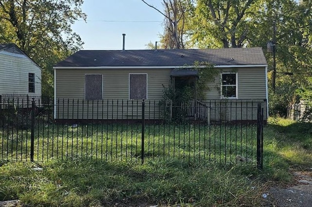 exterior space with a lawn and fence private yard