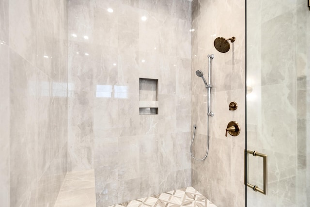 bathroom with a stall shower