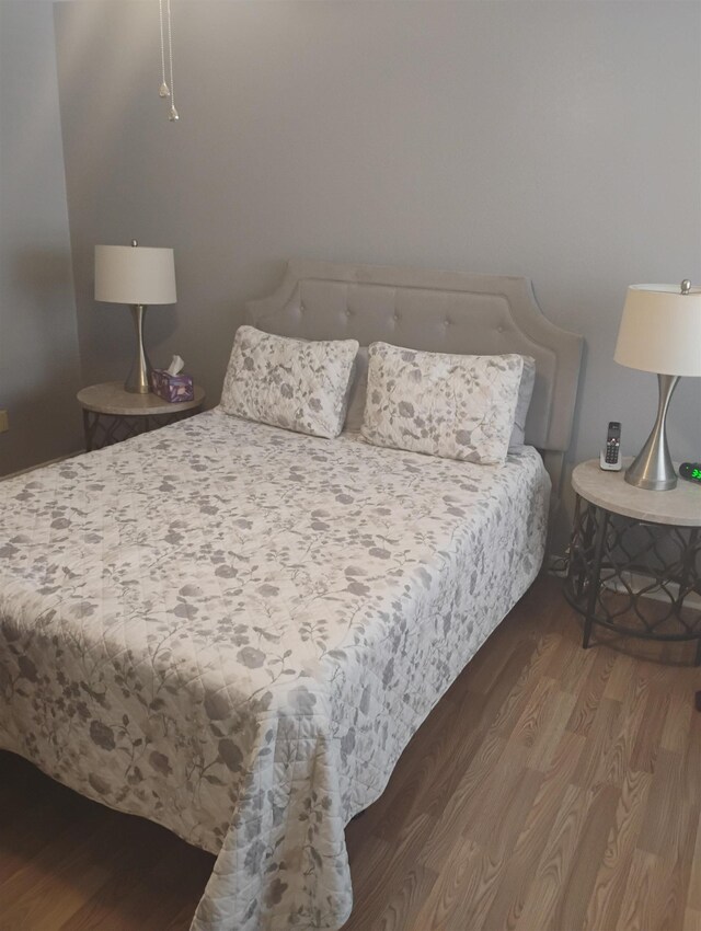 855 Creekside St Unit 303, Memphis, TN 38117 - bedroom with wood finished floors