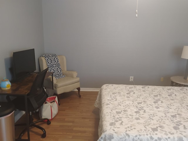 855 Creekside St Unit 303, Memphis, TN 38117 - bedroom featuring baseboards and light wood finished floors