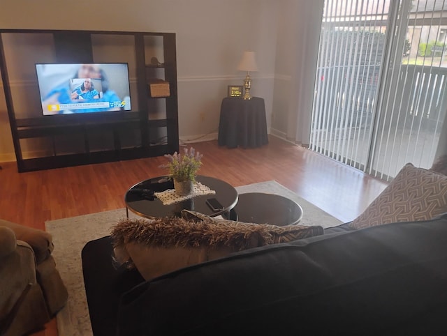 855 Creekside St Unit 303, Memphis, TN 38117 - living area featuring baseboards and wood finished floors