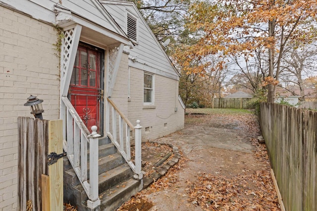3684 Marion Ave, Memphis, TN 38111 - view of home's exterior featuring entry steps, fence private yard, crawl space, and brick siding