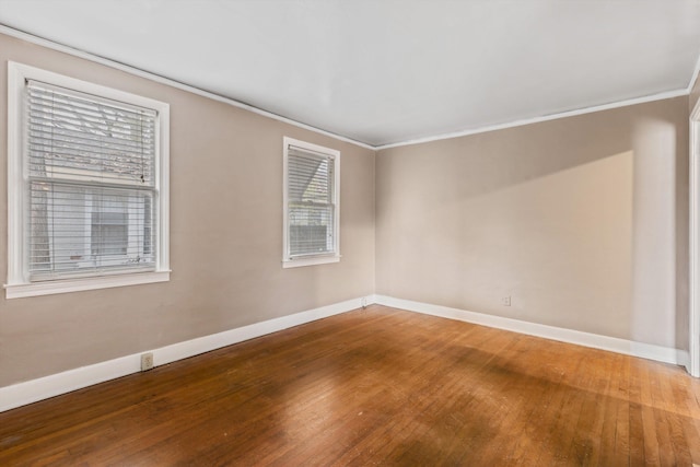 3684 Marion Ave, Memphis, TN 38111 - unfurnished room with baseboards, ornamental molding, and hardwood / wood-style flooring