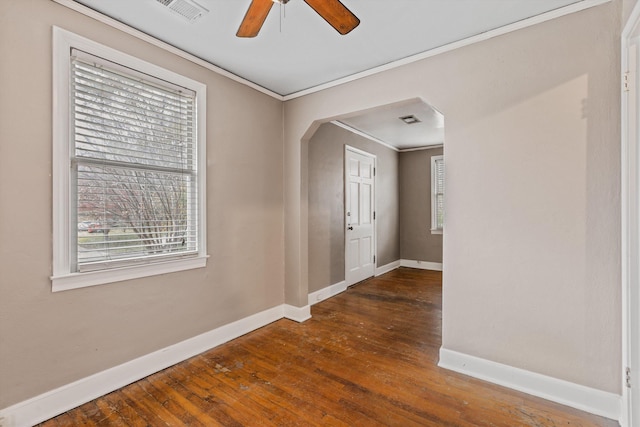 3684 Marion Ave, Memphis, TN 38111 - empty room featuring baseboards, visible vents, ornamental molding, and hardwood / wood-style floors