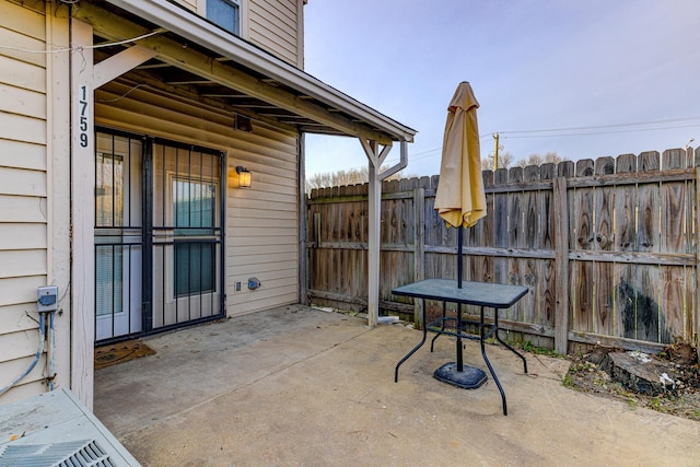 view of patio / terrace with fence