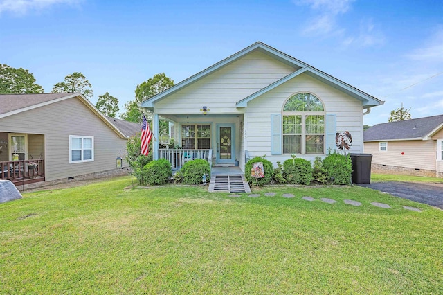 165 Ping Hill Dr, Counce, TN 38326 - view of front of home featuring a porch and a front yard