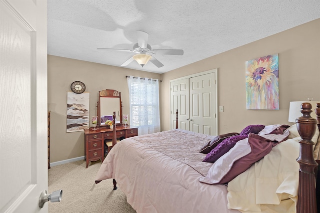 165 Ping Hill Dr, Counce, TN 38326 - bedroom with ceiling fan, a textured ceiling, carpet floors, baseboards, and a closet