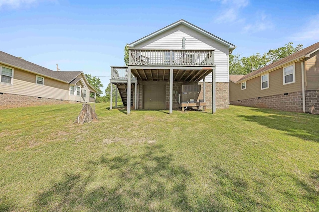 165 Ping Hill Dr, Counce, TN 38326 - rear view of property featuring a lawn, a deck, and stairs
