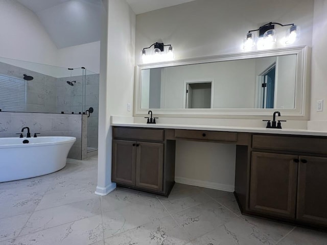 bathroom featuring double vanity, a sink, marble finish floor, and a stall shower