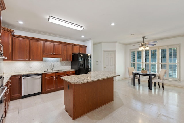 kitchen featuring a sink, black refrigerator with ice dispenser, a center island, decorative backsplash, and stainless steel dishwasher