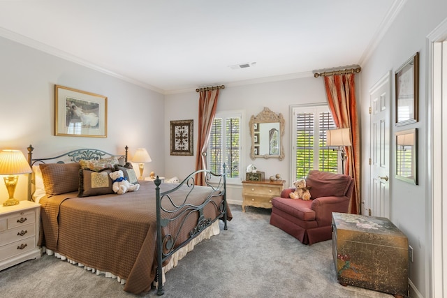 bedroom featuring carpet flooring, visible vents, and ornamental molding