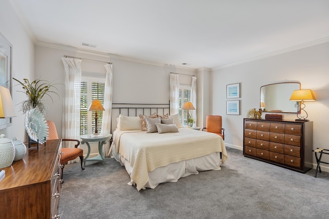 carpeted bedroom featuring visible vents, ornamental molding, baseboards, and multiple windows