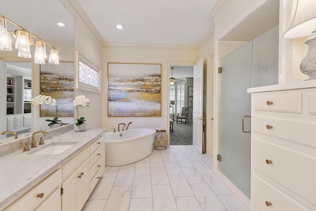 full bathroom with vanity, ornamental molding, marble finish floor, a freestanding tub, and a shower stall