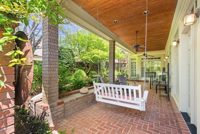 view of patio / terrace featuring ceiling fan
