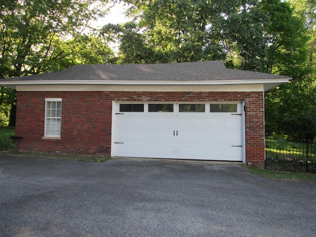 188 S Jefferson St, Ripley, TN 38063 - garage with fence and driveway