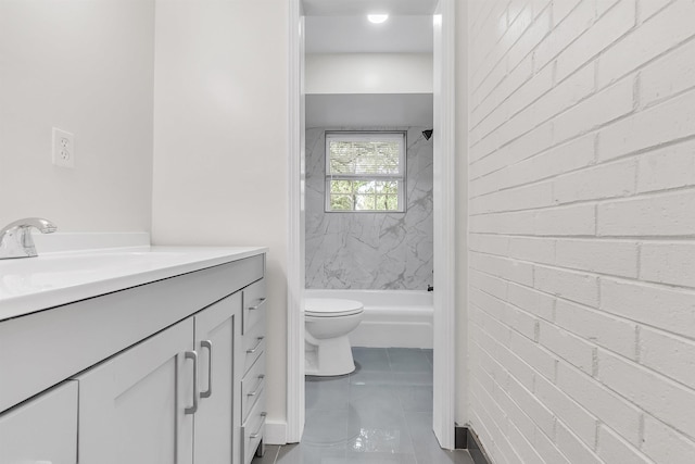 full bathroom with vanity,  shower combination, marble finish floor, and toilet