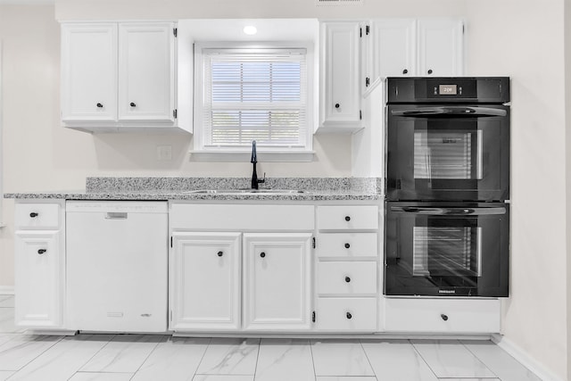 kitchen with a sink, dishwasher, dobule oven black, marble finish floor, and white cabinetry