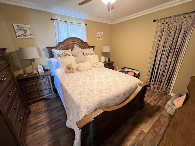 bedroom with ceiling fan, dark wood finished floors, and ornamental molding