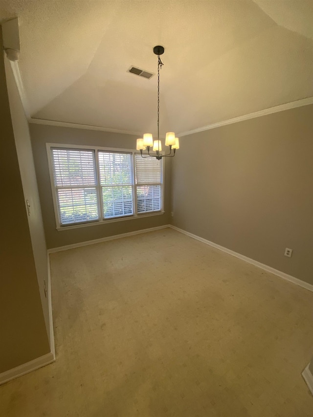 empty room with light carpet, a chandelier, lofted ceiling, visible vents, and ornamental molding