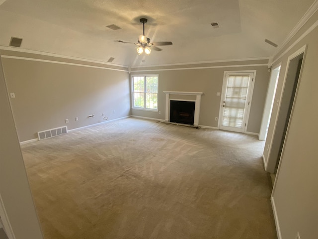 unfurnished living room with visible vents, ceiling fan, lofted ceiling, and light carpet