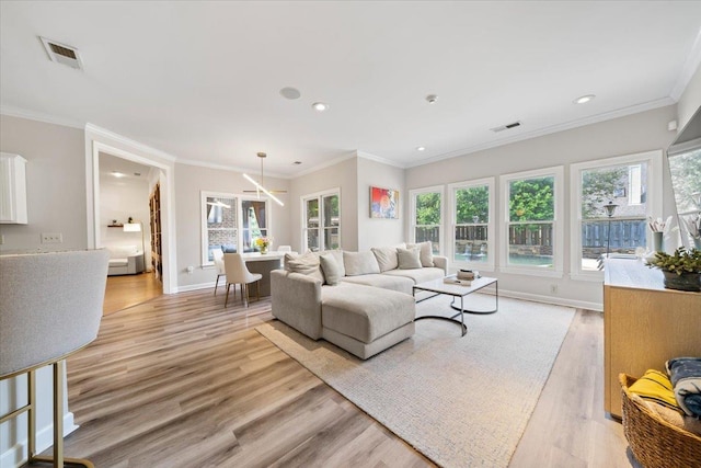 9842 Garden Pl, Collierville, TN 38139 - living area featuring light wood-style floors, baseboards, recessed lighting, and visible vents