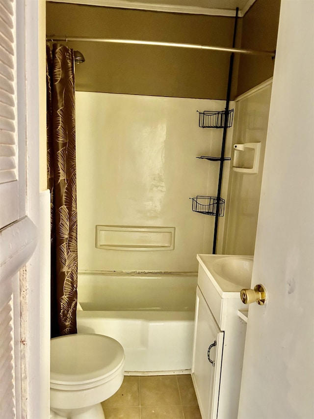 full bath featuring tile patterned flooring, toilet, shower / tub combo, and vanity