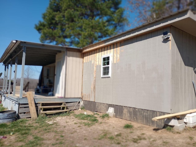 490 Early Bird Ln, Savannah, TN 38372 - view of side of home with a wooden deck