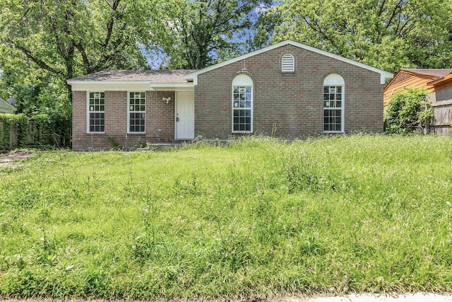 view of front of house featuring brick siding