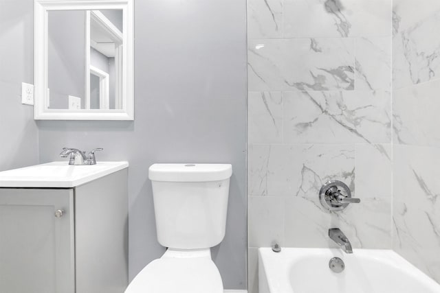 full bathroom with vanity, bathtub / shower combination, and toilet