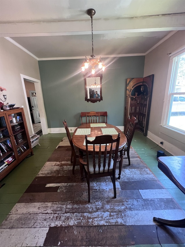 110 Shelton St, Covington, TN 38019 - dining area featuring crown molding, baseboards, an inviting chandelier, and lofted ceiling