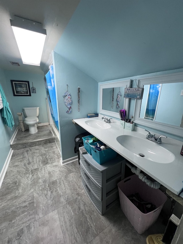 110 Shelton St, Covington, TN 38019 - full bathroom featuring baseboards, a sink, curtained shower, and toilet