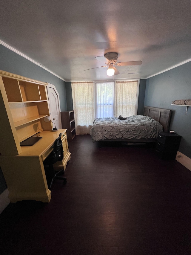 110 Shelton St, Covington, TN 38019 - bedroom featuring crown molding, ceiling fan, and dark wood-type flooring