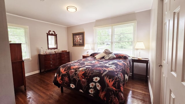 bedroom with baseboards, ornamental molding, and hardwood / wood-style floors