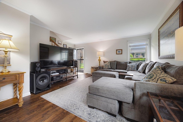 living room featuring crown molding, dark wood finished floors, and baseboards