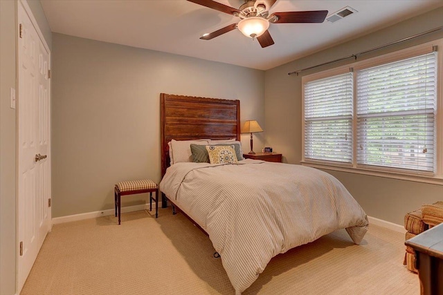 2178 E Glenalden Dr, Germantown, TN 38139 - bedroom with a ceiling fan, baseboards, visible vents, and light carpet