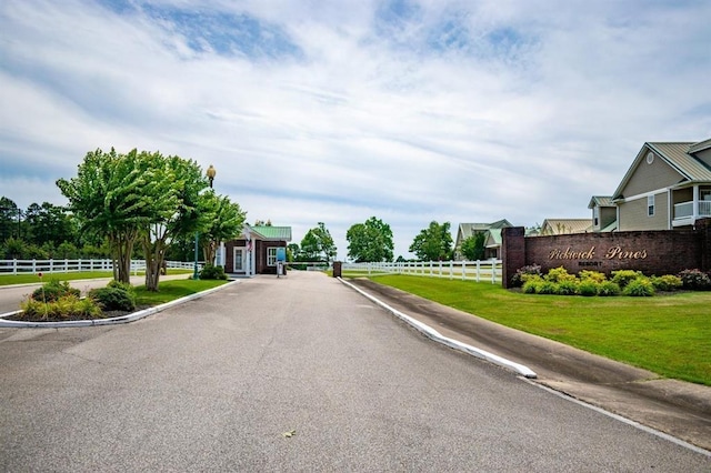 view of road featuring curbs