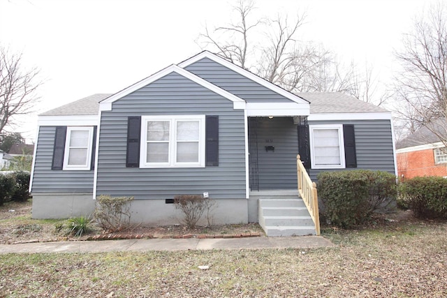 bungalow featuring a shingled roof