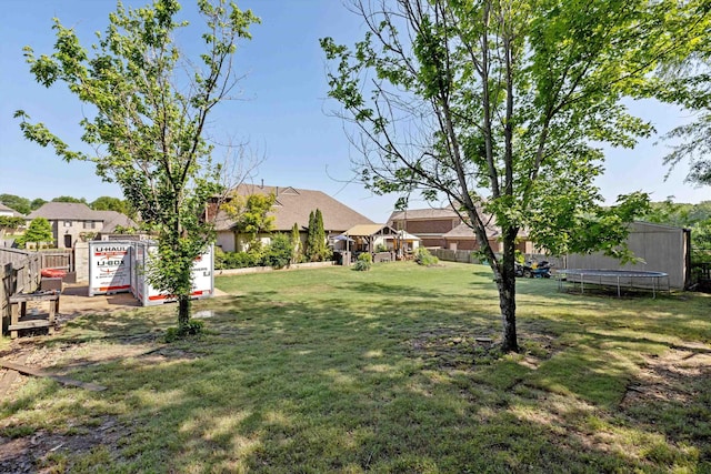 5376 Scarlet Ridge Dr, Arlington, TN 38002 - view of yard featuring a trampoline and fence