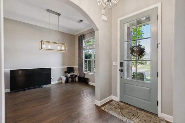 5376 Scarlet Ridge Dr, Arlington, TN 38002 - entryway featuring visible vents, crown molding, arched walkways, wood finished floors, and baseboards