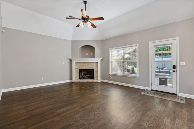 5376 Scarlet Ridge Dr, Arlington, TN 38002 - unfurnished living room featuring baseboards, a ceiling fan, dark wood-style flooring, and a brick fireplace